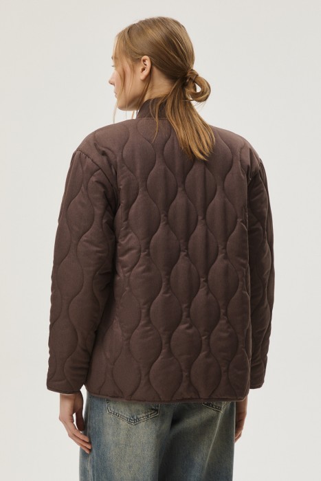 стеганая куртка по цене 5170 руб вид справа