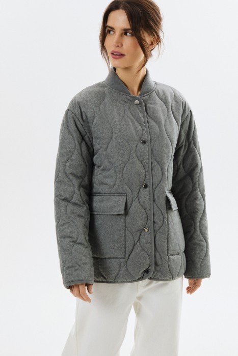 стеганая куртка от бренда снежная королева вид слева