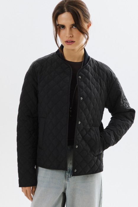 стеганая куртка от бренда снежная королева вид слева