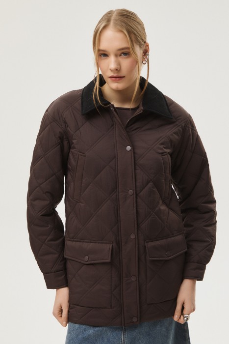 стеганая куртка от бренда снежная королева вид слева