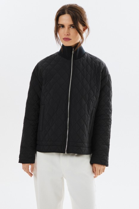 стеганая куртка от бренда снежная королева вид слева