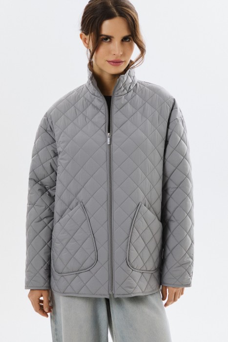 стеганая куртка от бренда снежная королева вид слева