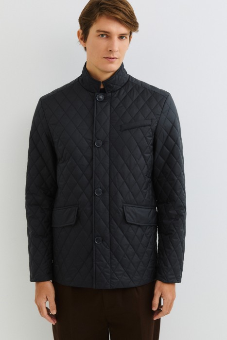 стеганая куртка  от бренда снежная королева вид слева