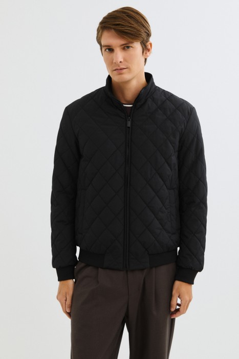 стеганая куртка от бренда снежная королева вид слева