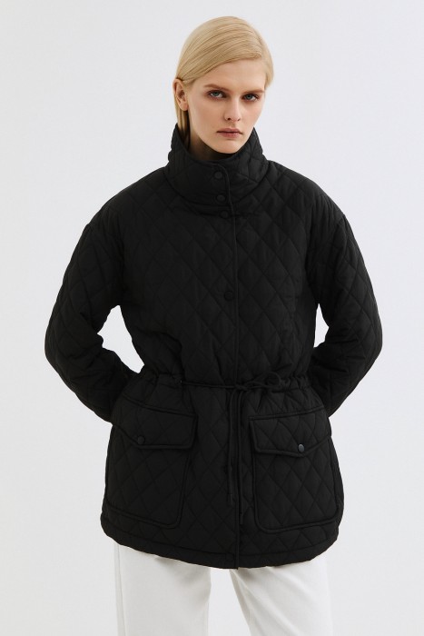 стеганая куртка от бренда снежная королева вид слева