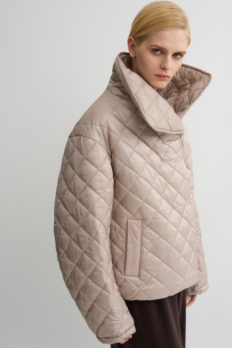 стеганая куртка от бренда снежная королева вид слева