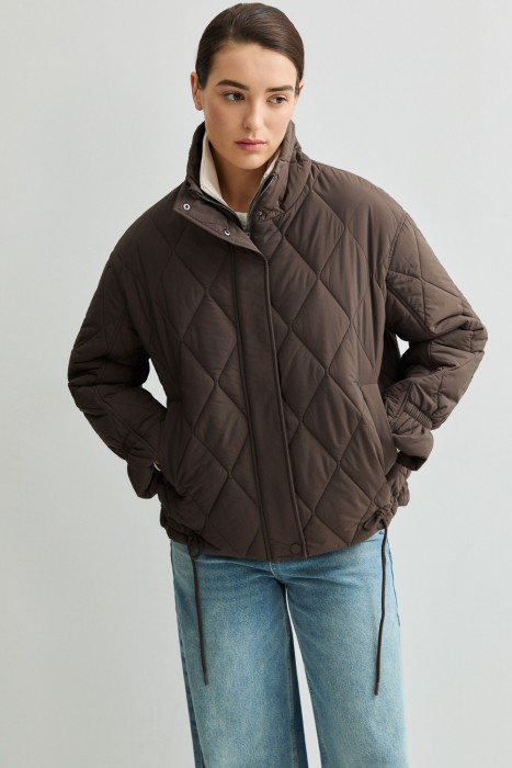 стеганая куртка от бренда снежная королева вид слева