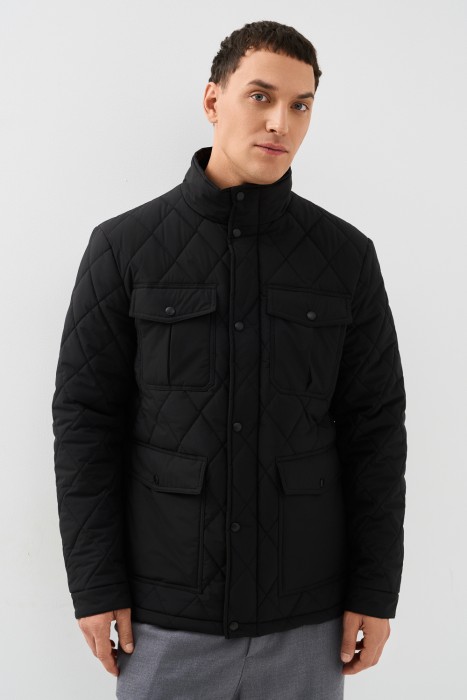 стеганая куртка от бренда снежная королева вид слева