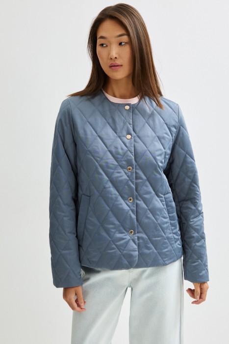 стеганая куртка от бренда снежная королева вид слева