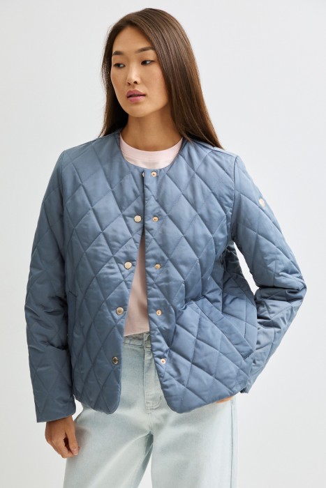 стеганая куртка из россии вид сбоку