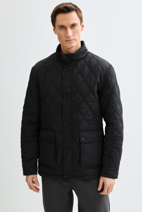 стеганая куртка от бренда снежная королева вид слева