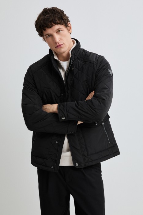 стеганая куртка от бренда снежная королева вид слева