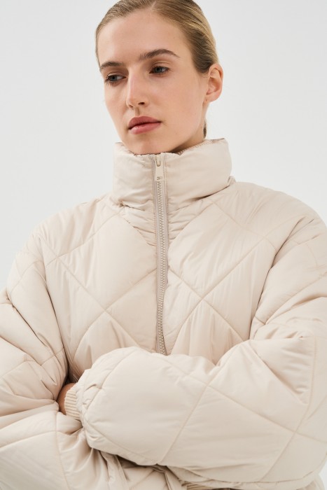 стеганая куртка от бренда снежная королева вид слева