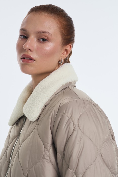 стеганая куртка из россии вид сбоку