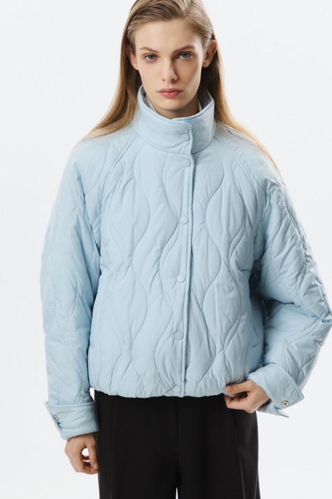 стеганая куртка от бренда снежная королева вид слева