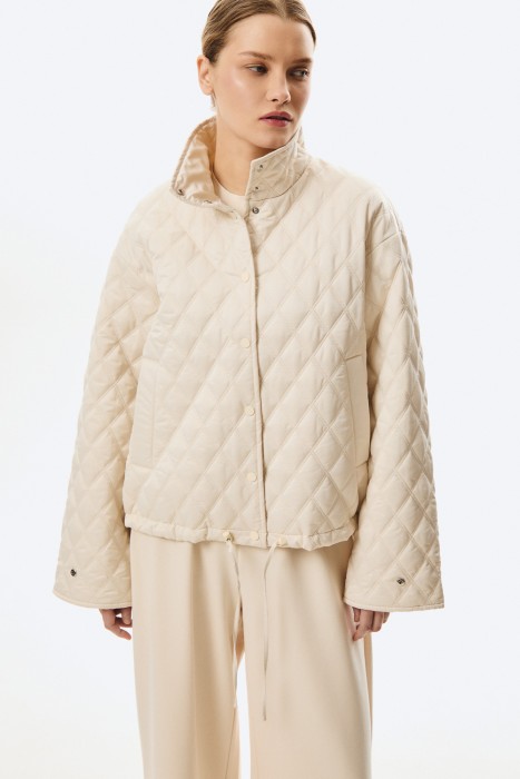 стеганая куртка от бренда снежная королева вид слева