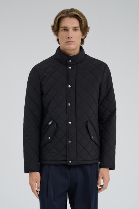 стеганая куртка от бренда снежная королева вид слева