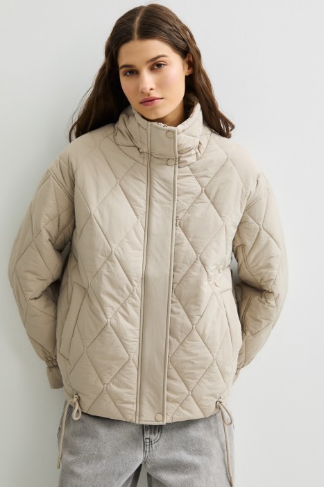 стеганая куртка от бренда снежная королева вид слева