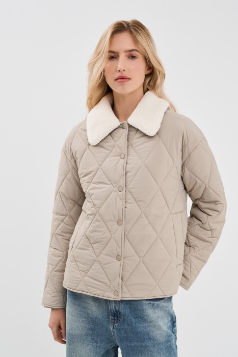 стеганая куртка от бренда снежная королева вид слева