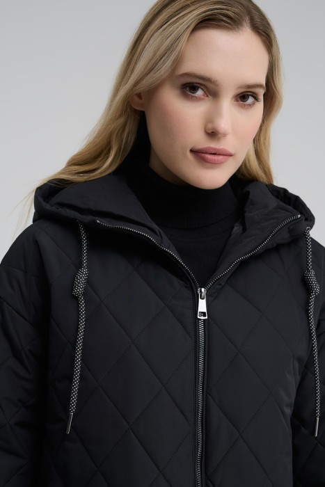 стеганое пальто с капюшоном из россии вид сбоку