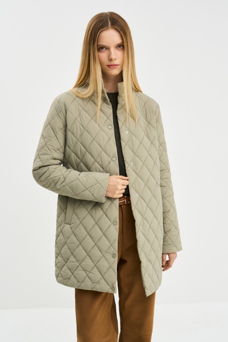 стеганое пальто от бренда снежная королева вид слева