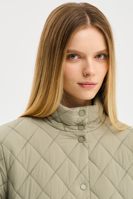 стеганое пальто из россии вид сбоку