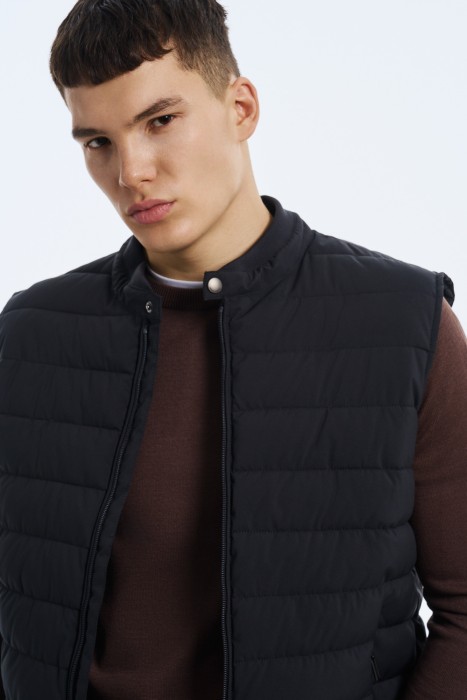 стеганый жилет из россии вид сбоку