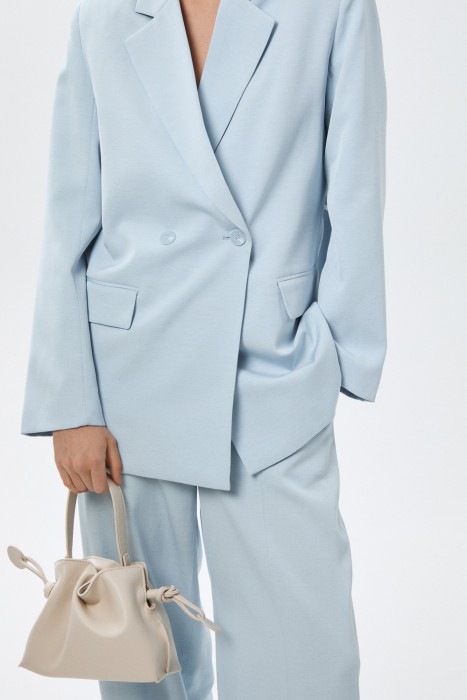 сумка из искусственной кожи от бренда снежная королева вид слева