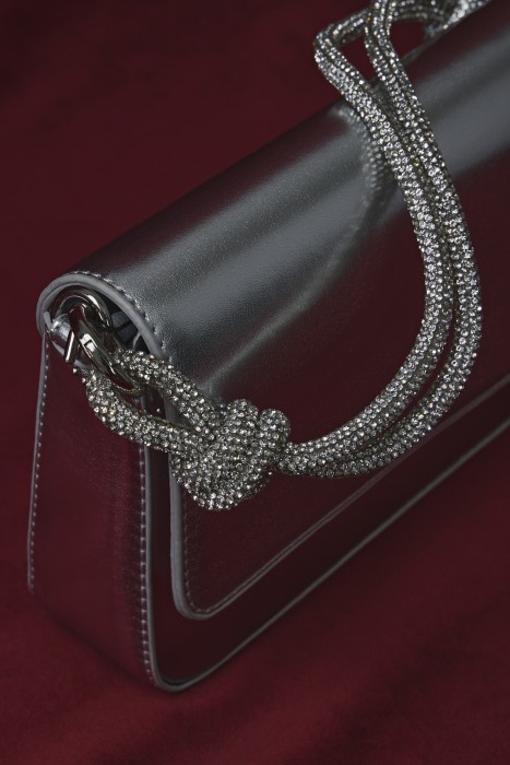 сумка из искусственной кожи от бренда снежная королева вид слева