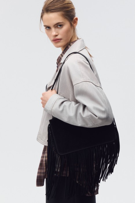 сумка из натуральной кожи от бренда снежная королева вид слева