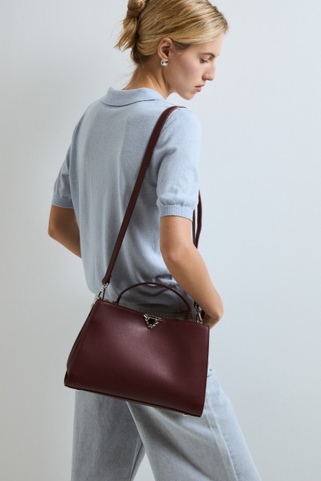 сумка из натуральной кожи от бренда снежная королева вид слева