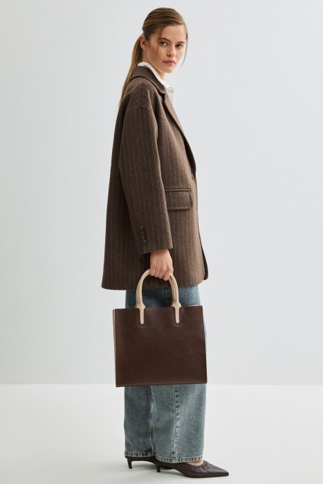 сумка из натуральной кожи от бренда снежная королева вид слева