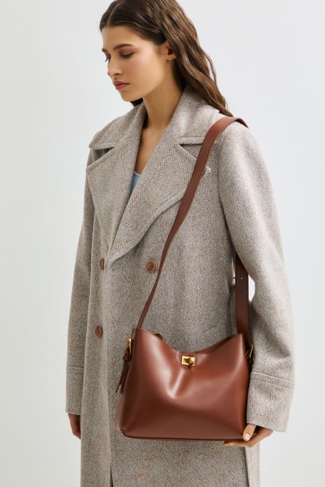 сумка из натуральной кожи от бренда снежная королева вид слева