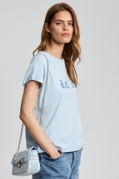 сумка из текстиля от бренда снежная королева вид слева