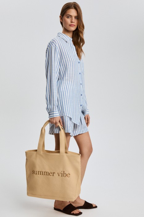 сумка из текстиля от бренда снежная королева вид слева