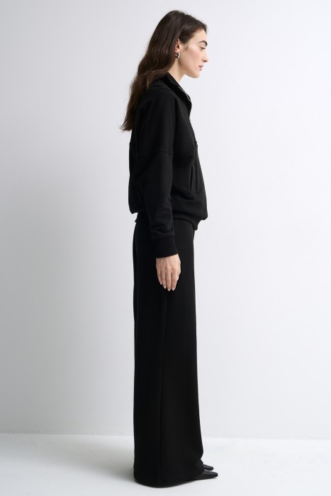 трикотажные брюки от бренда снежная королева вид слева