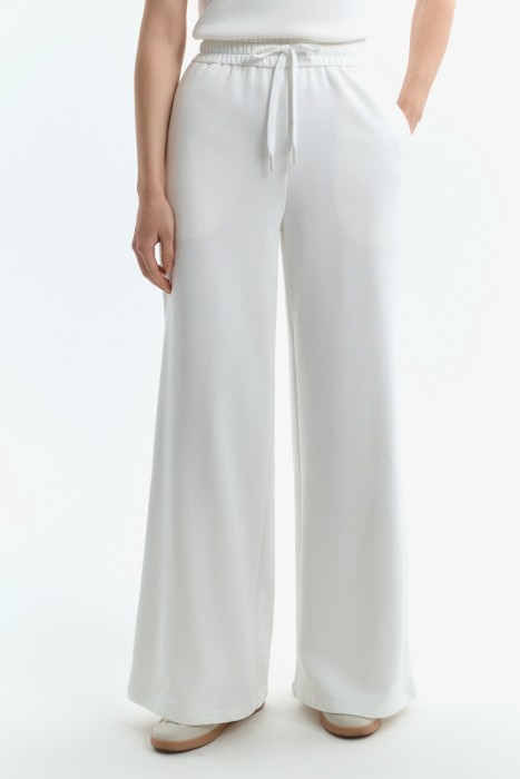 трикотажные брюки от бренда снежная королева вид слева