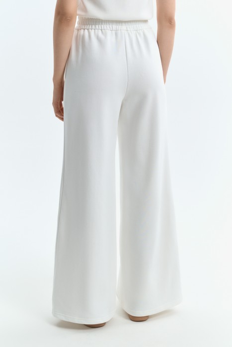 трикотажные брюки по цене 1480 руб вид справа