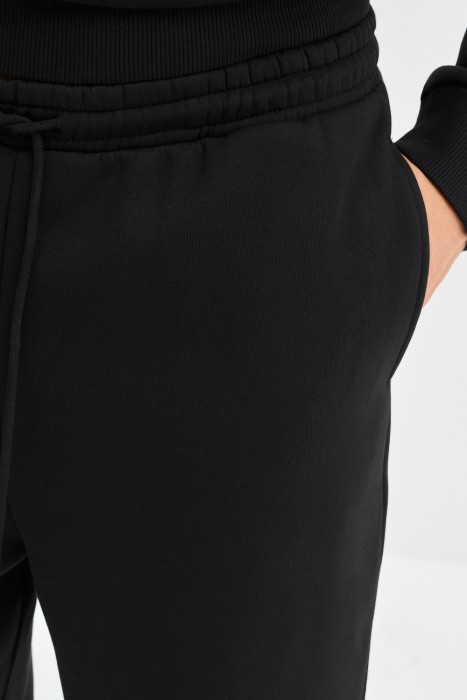 трикотажные брюки от бренда снежная королева вид слева