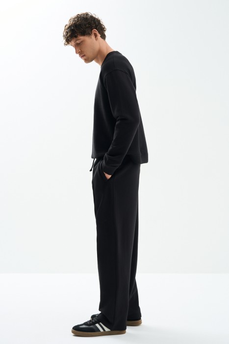 трикотажные брюки от бренда снежная королева вид слева