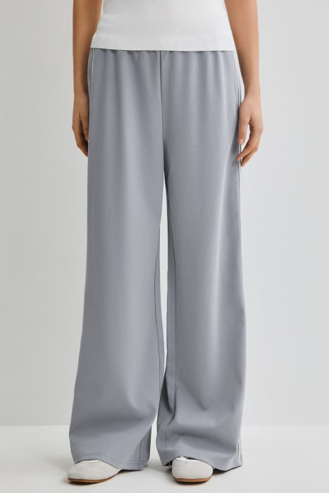 трикотажные брюки от бренда снежная королева вид слева