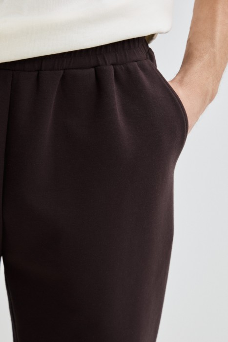 трикотажные брюки из россии вид сбоку