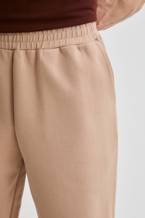 трикотажные брюки из россии вид сбоку