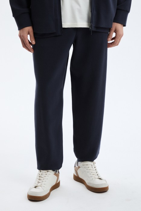 трикотажные брюки от бренда снежная королева вид слева