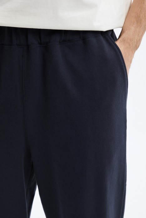 трикотажные брюки из россии вид сбоку