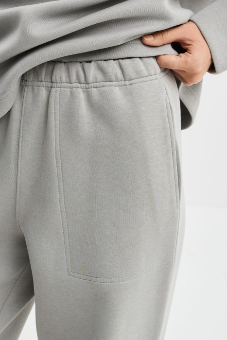 трикотажные брюки от бренда снежная королева вид слева