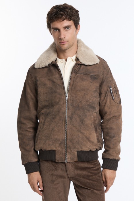 утепленная кожаная куртка от бренда снежная королева вид слева