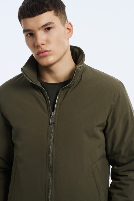 утепленная куртка из россии вид сбоку