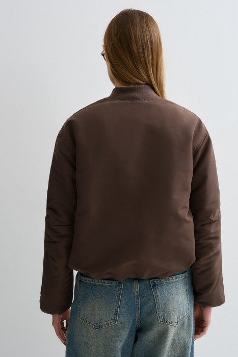 утепленный бомбер из россии вид сбоку