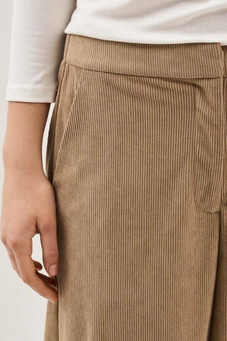 вельветовые брюки от бренда снежная королева вид слева